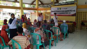 Penyaluran Bantuan PKH Plus di Kecamatan Grujugan Berlangsung Aman dan Tertib